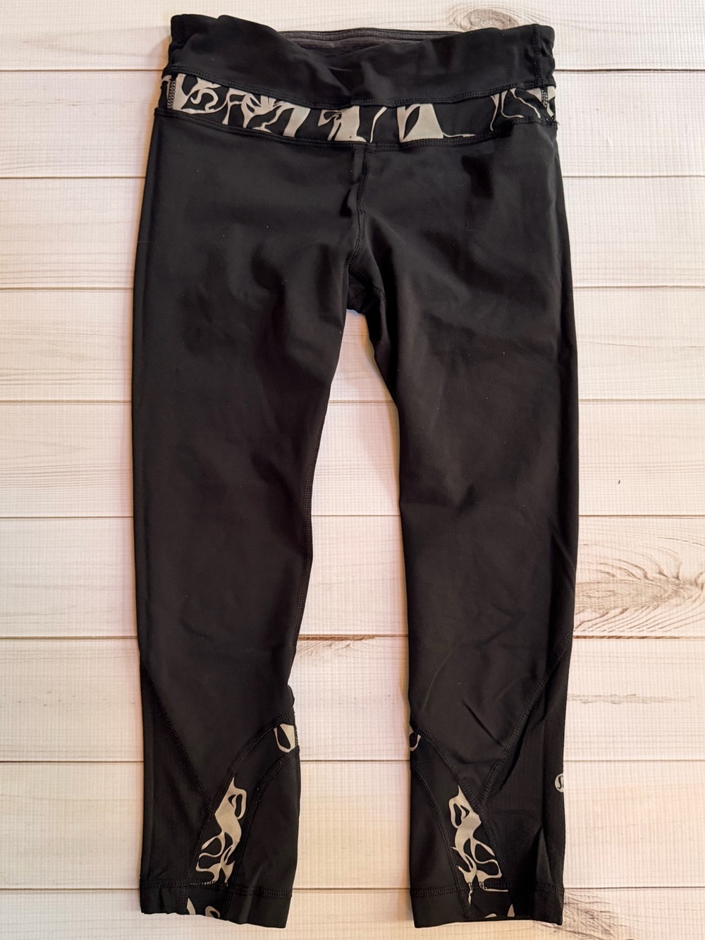 Lululemon Black Athletic Capri Leggings with Subtle Gray Print